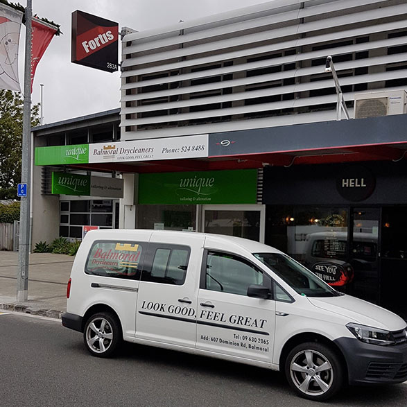 Gray Car in front of the Balmoral Drycleaners Store